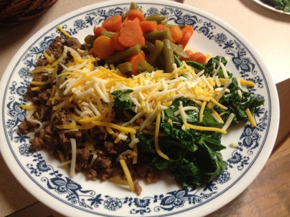 Ground beef, kale, and carrots and green beans. This was Daniel's plate, I don't cover my kale with cheese :-P